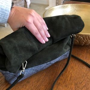 Free People: slouchy roll clutch